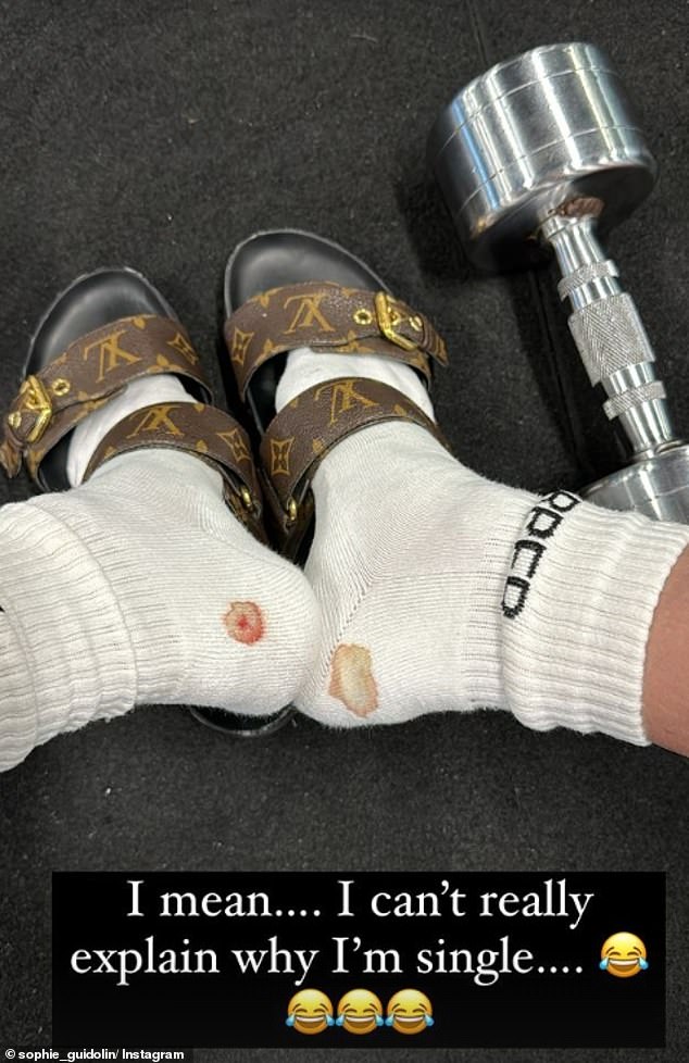 The fitness influencer, 34, took to her Instagram Stories to share a photo of her bleeding feet at the gym and her bizarre choice of shoes to avoid aggravating the injury further