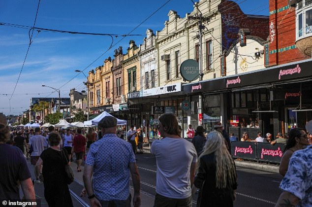 High Street in Northcote is known for its eclectic mix of cafes, bars, shops and live music venues.  Pictured are crowds of people at the recent Northcote Rise Festival