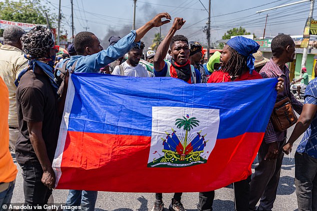 Haiti has been plunged into chaos after crime boss Jimmy 'Barbecue' Cherizier took control and called for a 'bloody uprising'