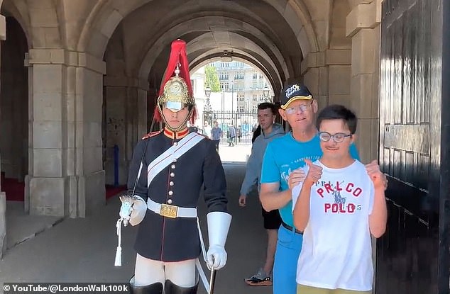 A member of the Kingsguard has been praised after going out of his way to make a young man with Down syndrome feel comfortable after getting closer to him as he posed for a photo