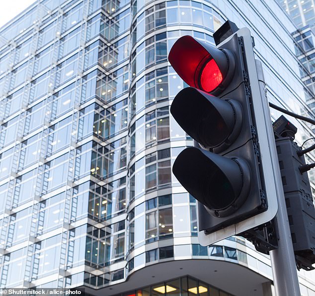 Traffic simulations show that the new light color could reduce traffic by up to 25 percent when autonomous vehicles are widely deployed (stock image)