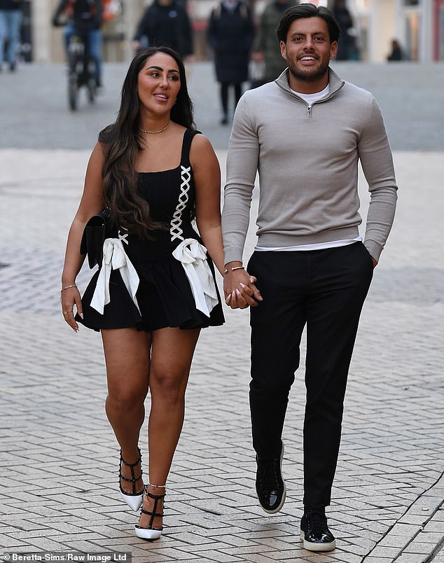 Sophie Kasaei and Jordan Brook arrived hand in hand with Sophie wearing a beautiful white and black mini dress