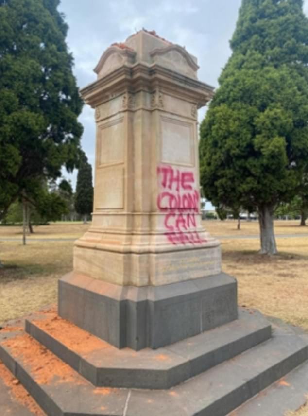 A slogan saying 'the colony may fall' was spray-painted on the plinth holding the statue of Queen Victoria (pictured)