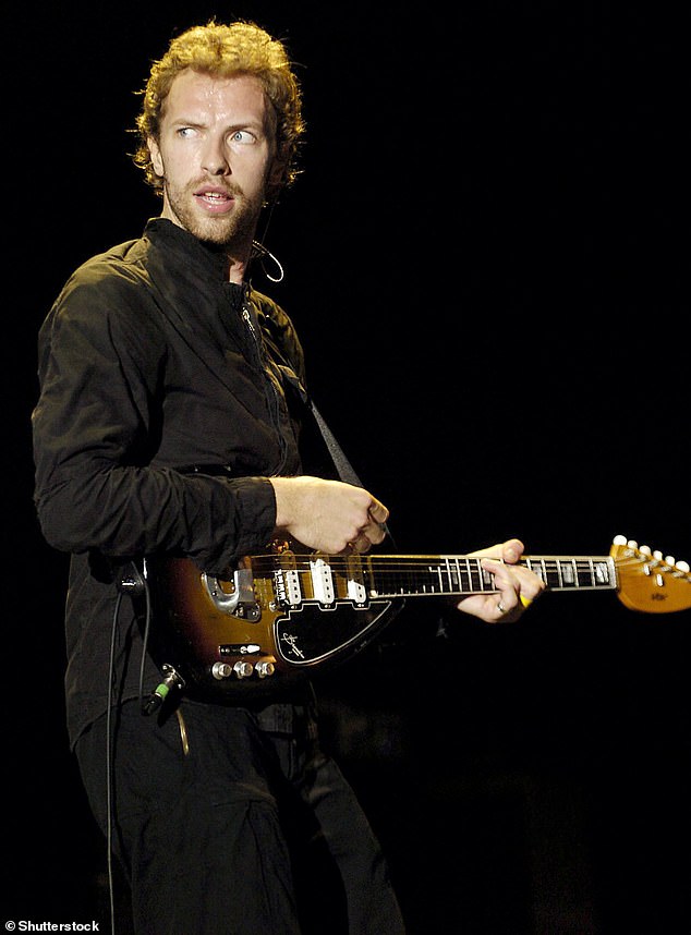 Chris Martin on stage at the Glastonbury Festival with Coldplay in 2005. The band will make history when they make their fifth headline performance at Worthy Farm in June.