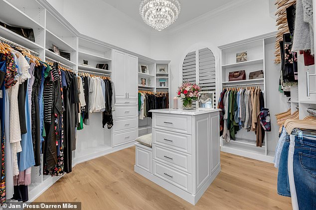 A huge walk-in closet is located just steps from the master bedroom