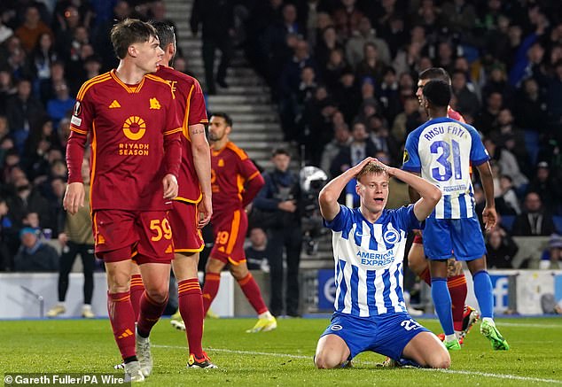 Jan Paul van Hecke puts his head in his hands after wasting a golden opportunity for Brighton