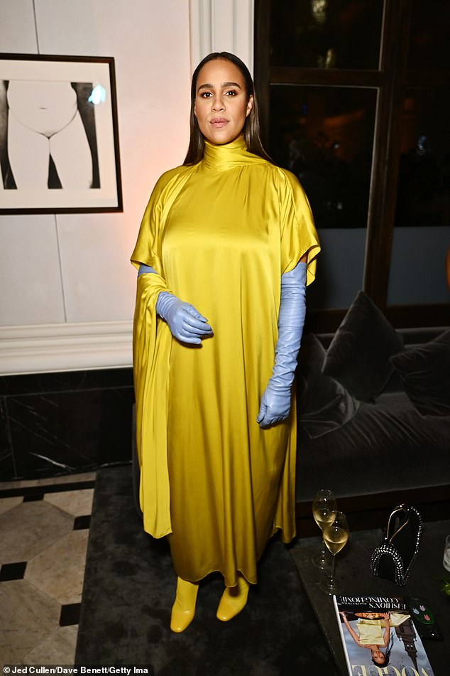 Zawe Ashton radiated elegance in a satin yellow dress and accessorized with striking long blue gloves