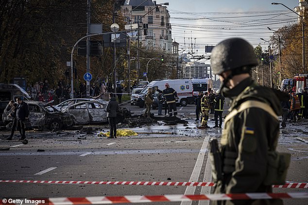 Emergency services go to the site of the explosion on October 10, 2022 in Kiev, Ukraine