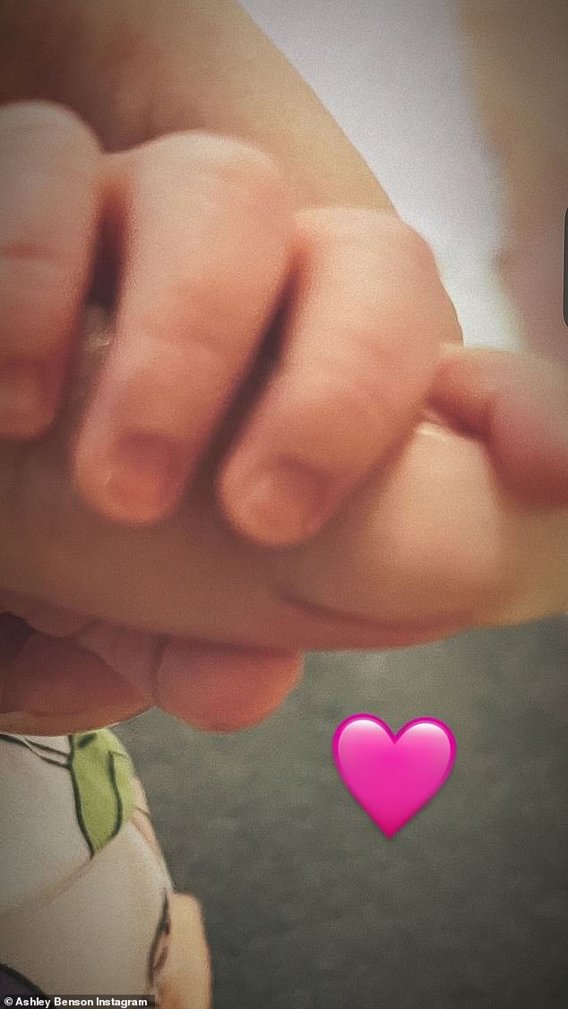 Late last month, on February 29, Benson took to her Instagram Stories to share a close-up image of her daughter's tiny hand wrapped around her own finger