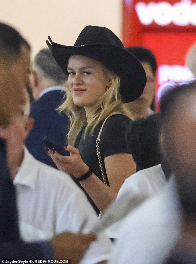 Friday to Texas.  Madeleine had brought home a souvenir from the state and walked through Sydney Airport with a large black cowboy hat on her head.