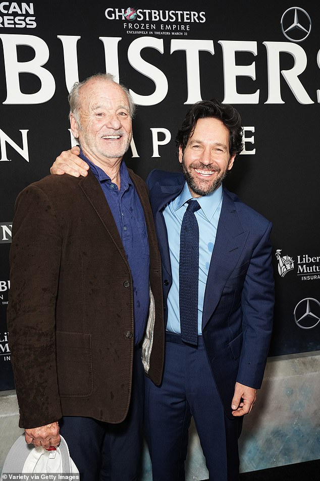 The two actors stopped playing with each other long enough to pose for a photo