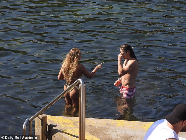 Jayden, 26, showed off his toned physique in red-striped swim shorts as he enjoyed a dip to cool off