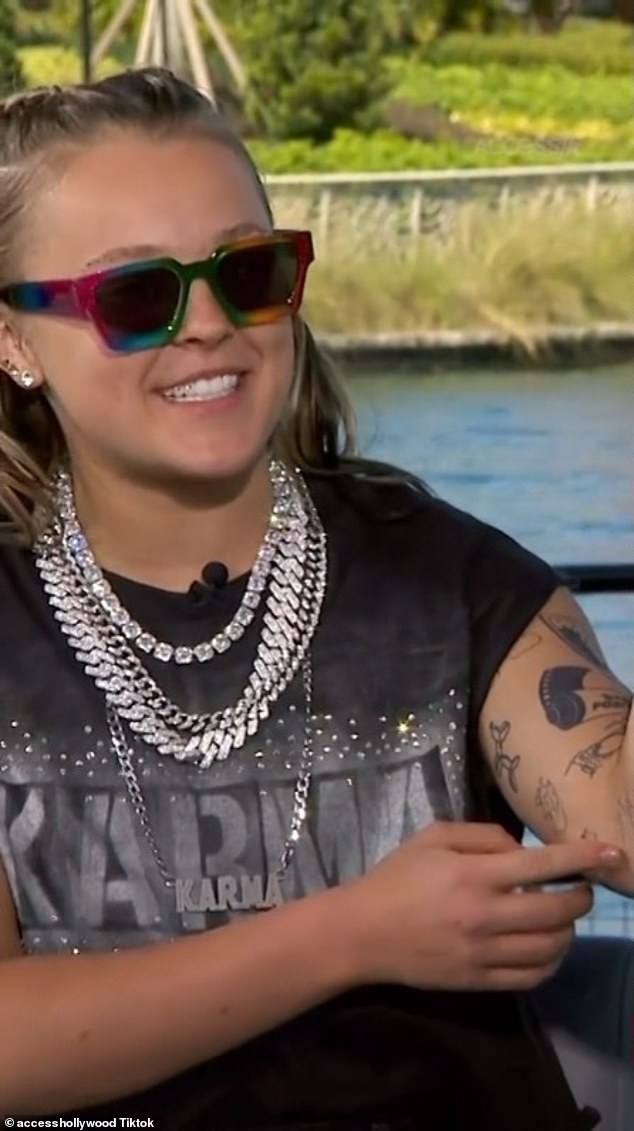 “I actually have two tattoos dedicated to them.  This one is dedicated to my little girl one day, her name is Freddie,” JoJo revealed as she pointed to some ink on the inside of her left elbow.