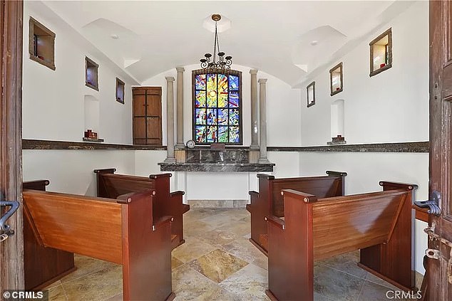 The property features a serene chapel with stained glass windows and hand-carved Indian temple doors