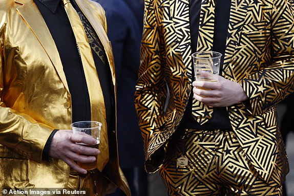 Horse Racing - Cheltenham Festival - Cheltenham Racecourse, Cheltenham, Great Britain - March 15, 2024 Racegoers are seen before the races Action footage via Reuters/Peter Cziborra