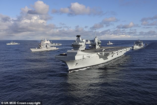 HMS Prince of Wales leads the formation of fifteen ships on March 13, 2024 through exercises that continue until Friday