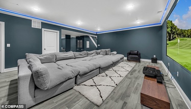 Wilson's home also features a media room – apparently in the basement – ​​with a big screen TV