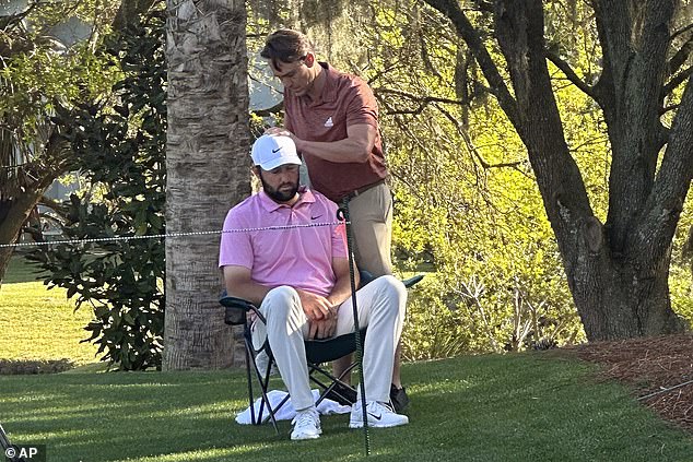 World No. 1 Scottie Scheffler required treatment for a neck injury during Friday's second round