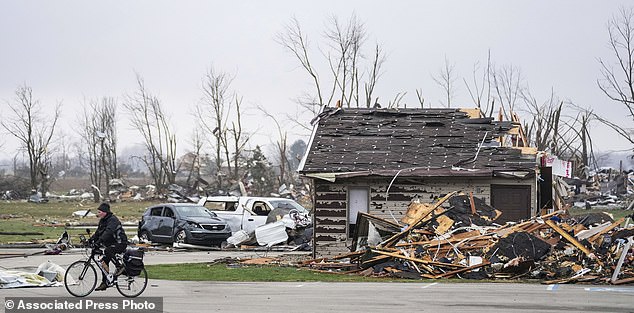 Homes and businesses were damaged after an overnight severe storm on Friday, March 15, 2024 in Winchester, Indiana.  Severe storms with suspected tornadoes have damaged homes and businesses across the central United States.  (Grace Hollars/The Indianapolis Star via AP)