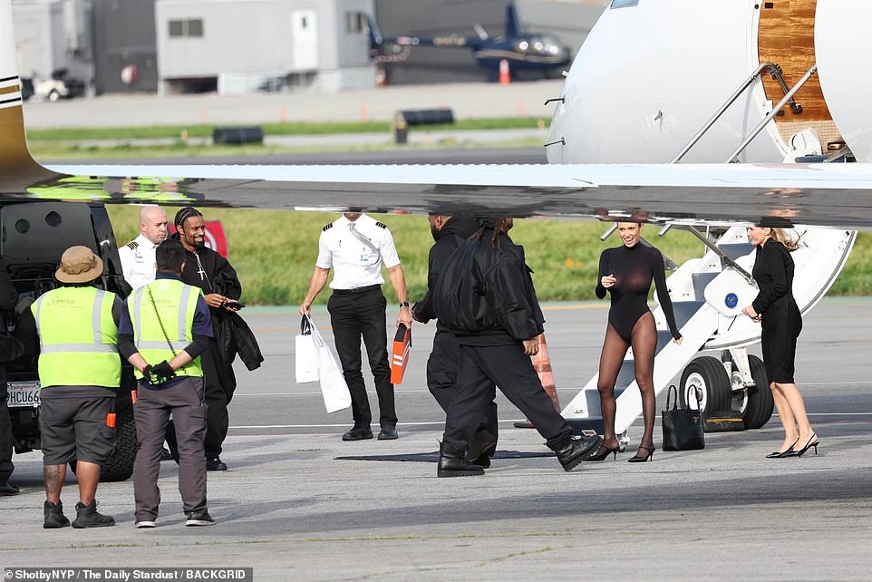 Everyone seemed to be having a good time on the tarmac as they laughed and chatted