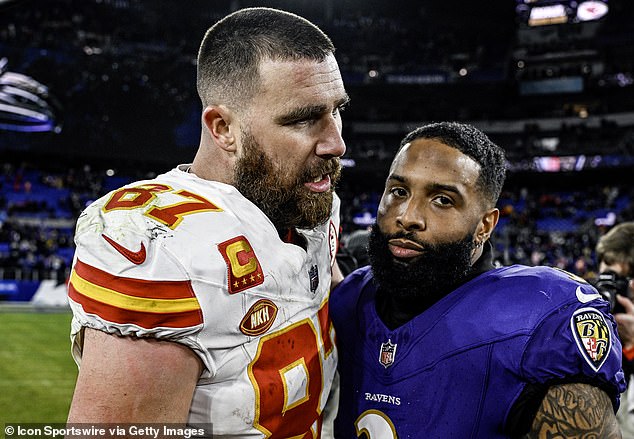 Football star Travis Kelce, left, attended the show without girlfriend Taylor Swift