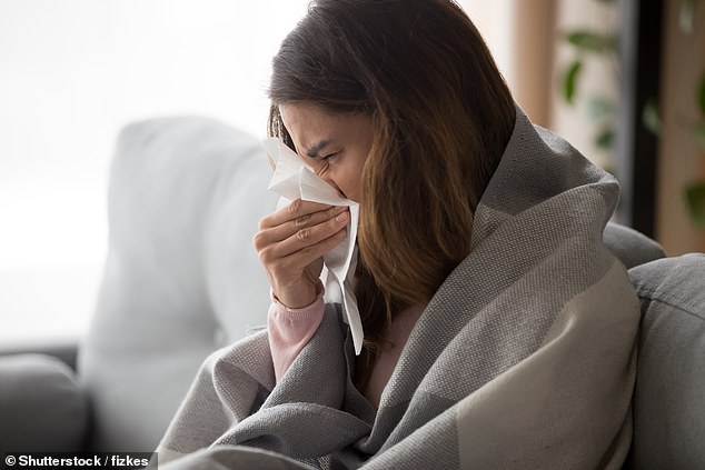 Those who reported having long-term Covid symptoms – persistent symptoms such as 'brain fog' – scored six points lower and those with only a mild infection two points lower.  (Stock image.)