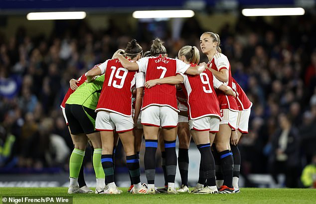 The Gunners ended up playing in Chelsea away socks with tape wrapped around the Nike logo