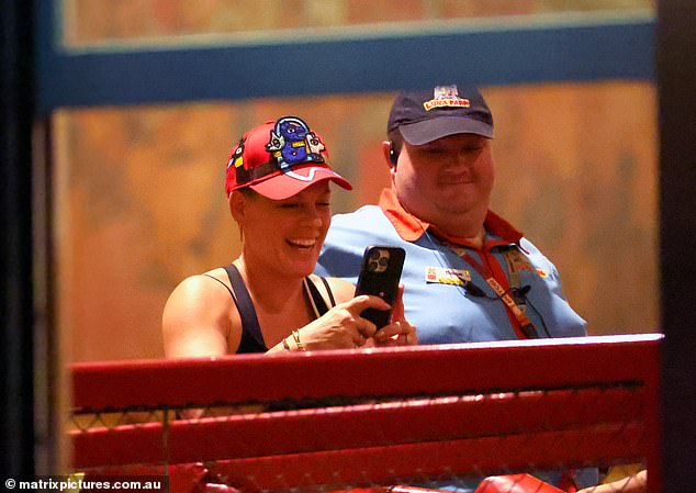 Later, the American superstar took photos of her children and husband as they went on other attractions