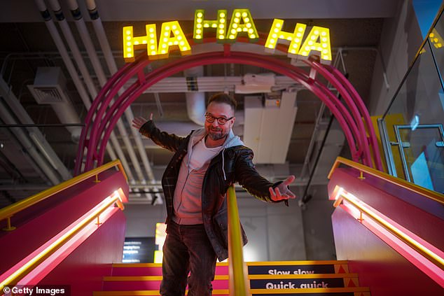 Blackpool-born actor and singer Alfie Boe OBE poses at the entrance to the Showtown Museum in Blackpool