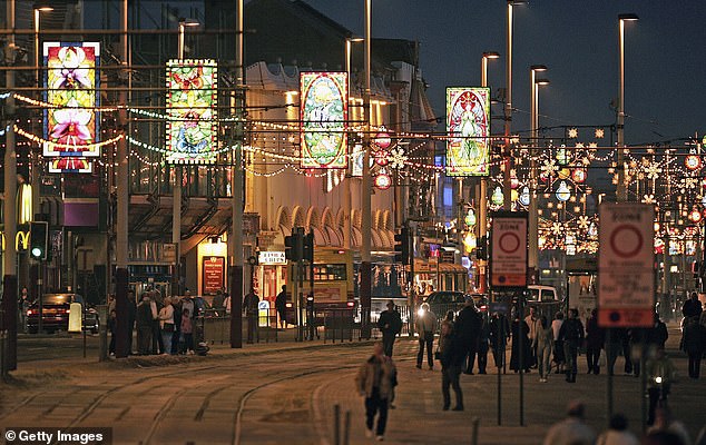 Street lights can be seen at night in the traditional holiday destination of Blackpool on October 5, 2005