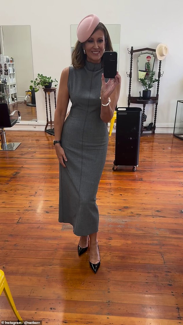 The Sunrise star looked chic in a fitted gray dress with a columnar cut that hugged her figure.  The television host added a chic pastel pink hat to her look, as well as a pair of black heels