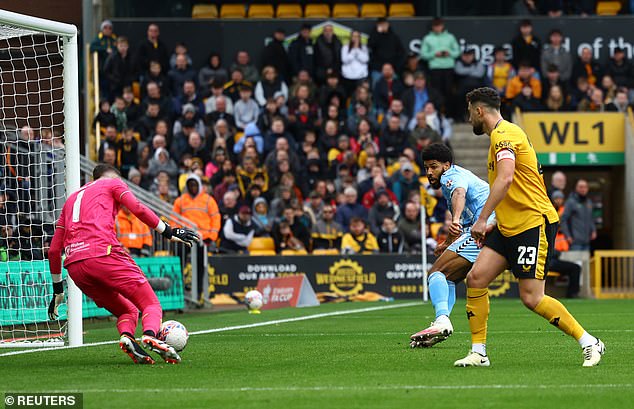 In front of an empty net, Simms sent the ball straight to Wolves goalkeeper Jose Sa