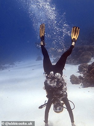 Abbi diving in Fakarava, an atoll in the Tuamotu Islands in French Polynesia