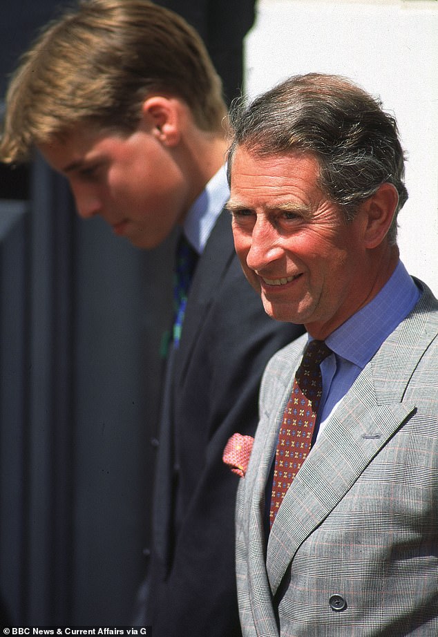 William stands with head bowed with Prince Charles outside Clarence House as he celebrates the Queen Mother's 98th birthday