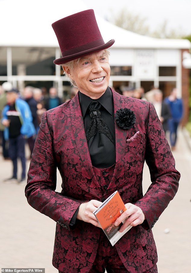 Wonka inspired!  Another racegoer opted for a top hat and purple suit