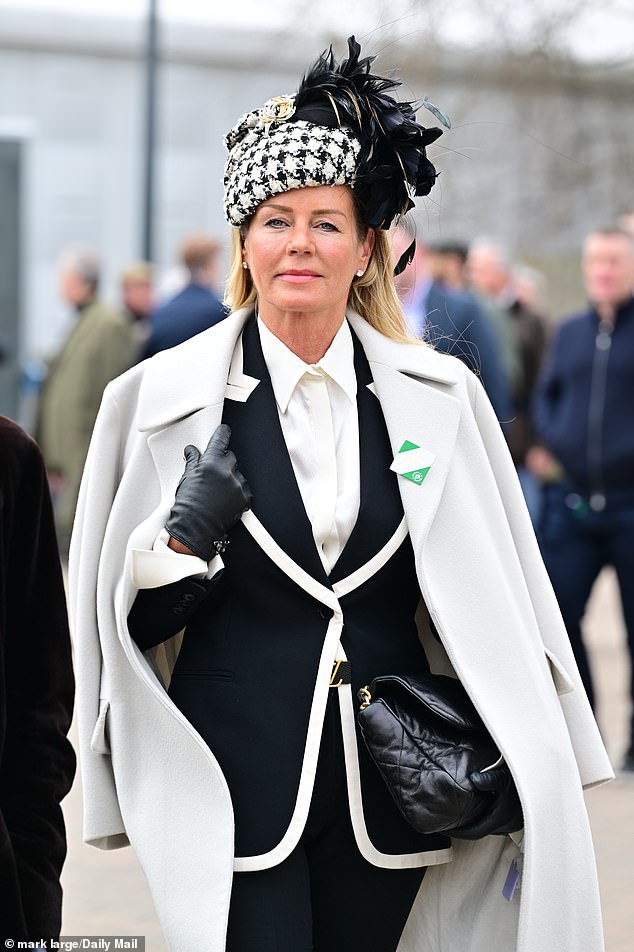 Monochrome magic!  This racegoer opted for a striking monochrome ensemble for his annual event