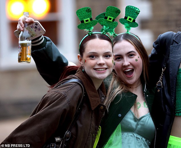 Pictured: Partygoers kicked off the St. Patrick's Day celebrations earlier with a night out full of booze