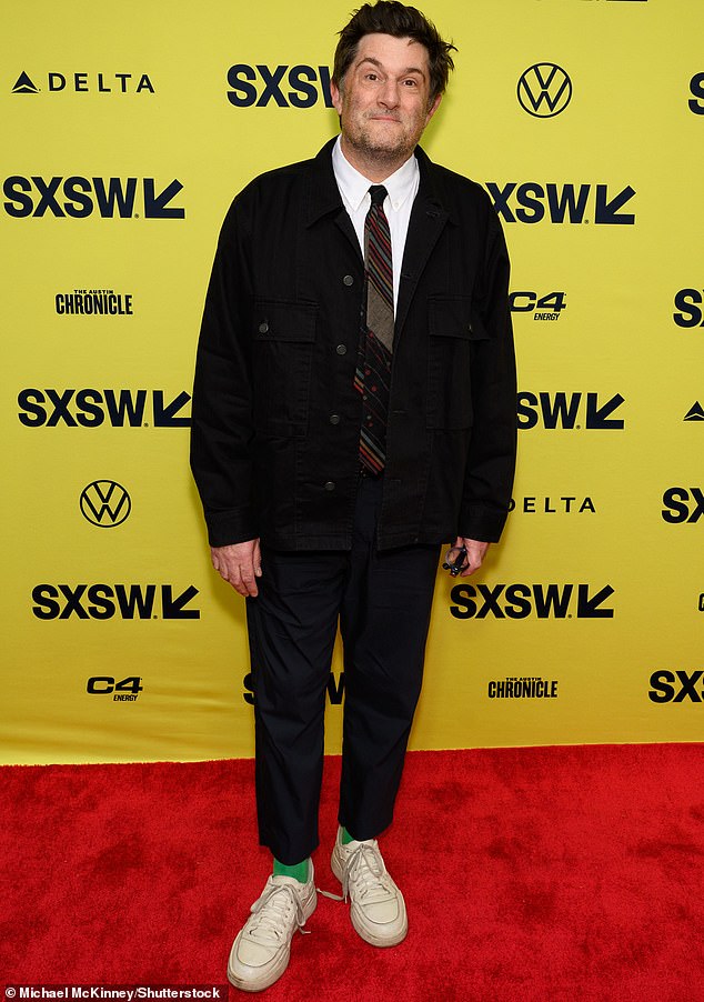 Meanwhile, Michael Showalter, the pic's director, wore a shirt and tie under a more casual jacket, teaming the look with sneakers