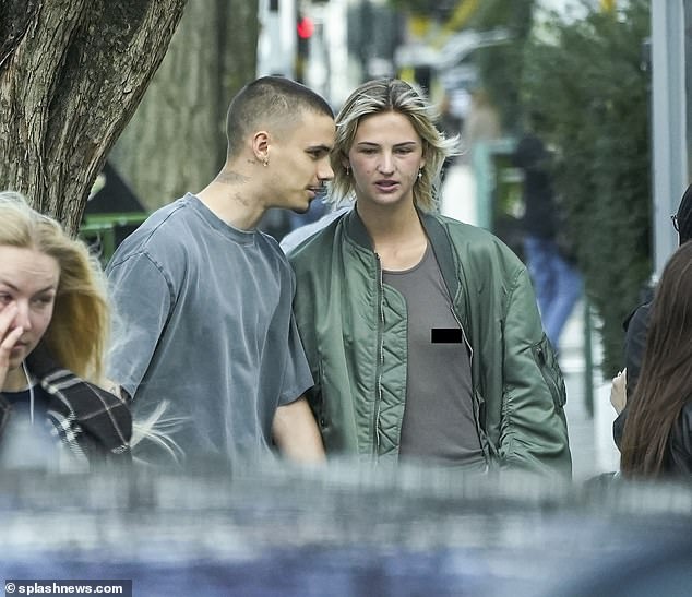 1710670227 752 Romeo Beckham is hand in hand with braless Mia Regan as on off