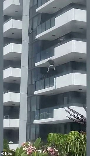 The man jumped from the balcony and plunged into the complex's swimming pool before fleeing on foot