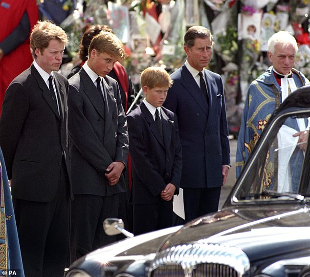 Earl Spencer (left), Prince William, Prince Harry and the Prince of Wales wait as the hearse carrying the coffin of Diana, Princess of Wales prepares to leave Westminster Abbey in 1997