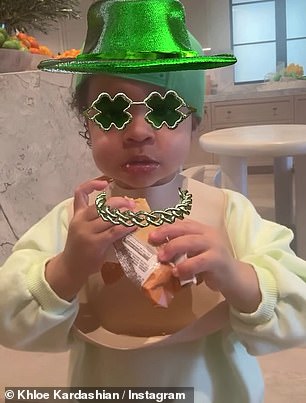 She added a green hat, some four-leaf clovers and a gold Celtic knot necklace to the scene