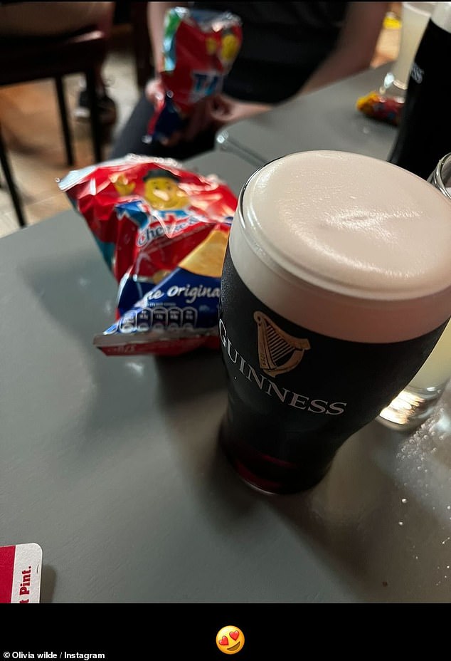 The actress also shared a throwback photo from a pub, where she enjoyed a pint of Guinness and a bag of chips