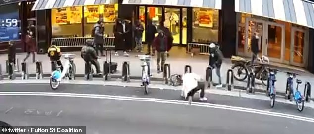 In a video posted on X by Fulton St Coalition on January 4, a fight broke out between two people when one person was violently pushed into the street as cars drove by.