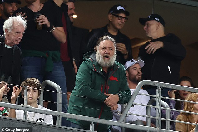 The motivation expert even claimed that Souths co-owner Russell Crowe (pictured during a match with fellow Hollywood stars Jeff Goldblum, second from top right, and Chris Hemsworth, wearing white cap) was locked out of the Bunnies dressing room in 2014.