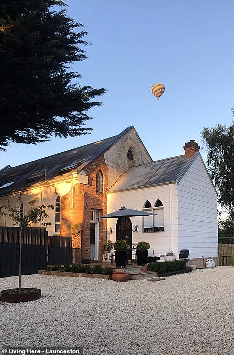 The picturesque chapel houses three bedrooms, a large family room under a two-story loft, a modern kitchen and a beautiful courtyard