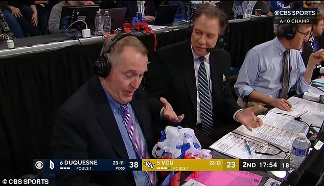 In the booth, the commentators had to clear their desks so they could see their notes