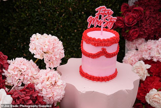 A retro-style cake in a blush shade with bright red icing was on offer for guests to enjoy