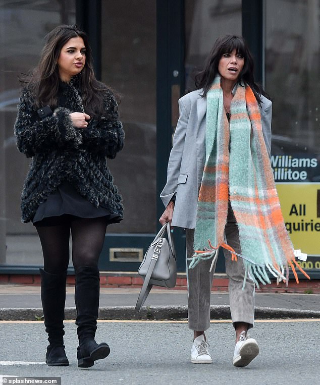 The 55-year-old presenter cut a stylish figure in a gray suit jacket and checked trousers while out and about with her 23-year-old daughter