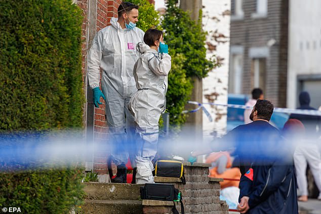 Police crime scene inspects a house where a police officer was murdered on March 18, 2024